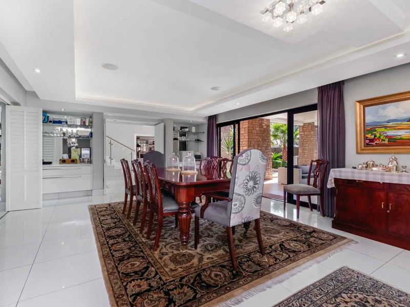 A PRIZED PROPERTY READY FOR ITS NEXT OWNERS BOASTS A FLEXIBLE LAYOUT AND IS TASTEFULLY DESIGNED WITH CAPTIVATING DETAIL - Photo 6