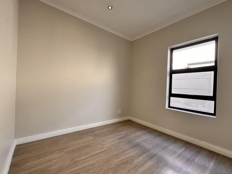 Modern Three-Bedroom Home in Parklands North - Photo 6