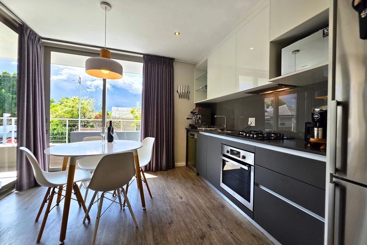 Modern 2-Bedroom Apartment with Magnificent Mountain Views - Photo 3