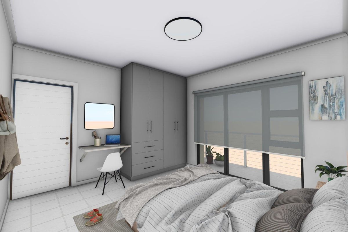 A modern bedroom featuring built-in grey cabinetry, a wall-mounted desk, tiled flooring, and large windows with roller blinds leading to a balcony.