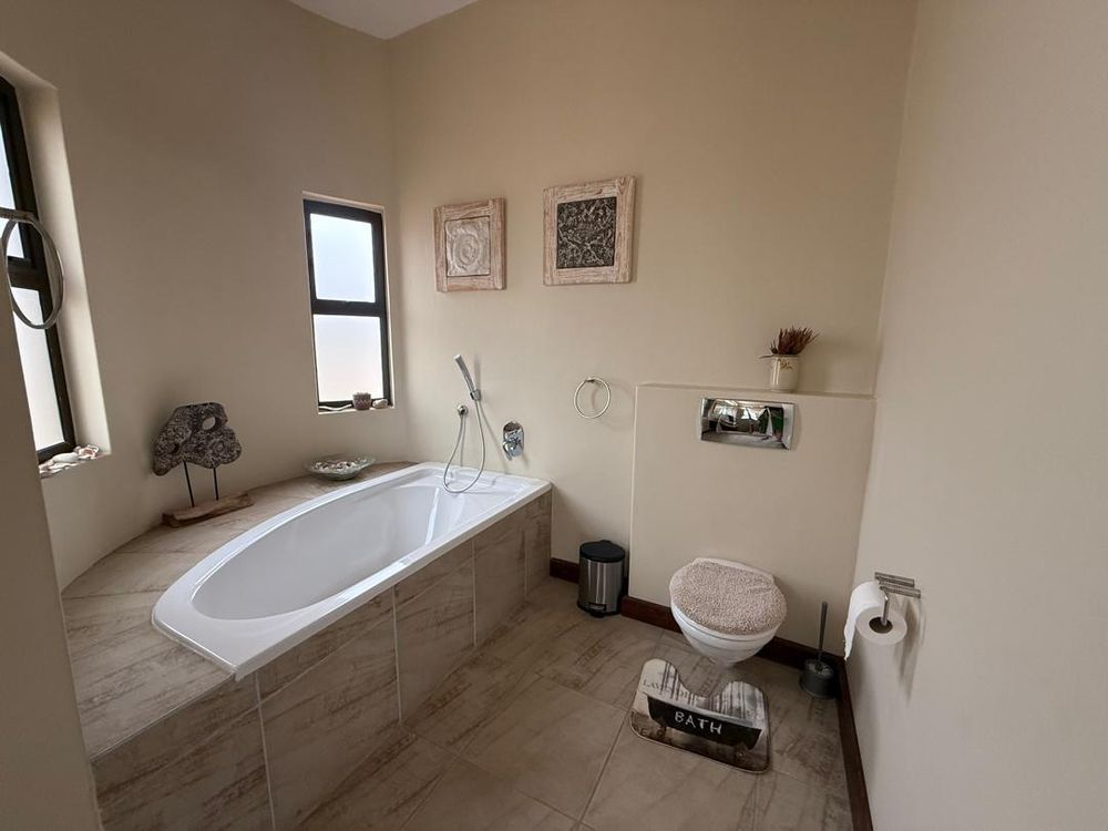 Ground floor, bedroom one, built-in cupboards and en-suite bathroom