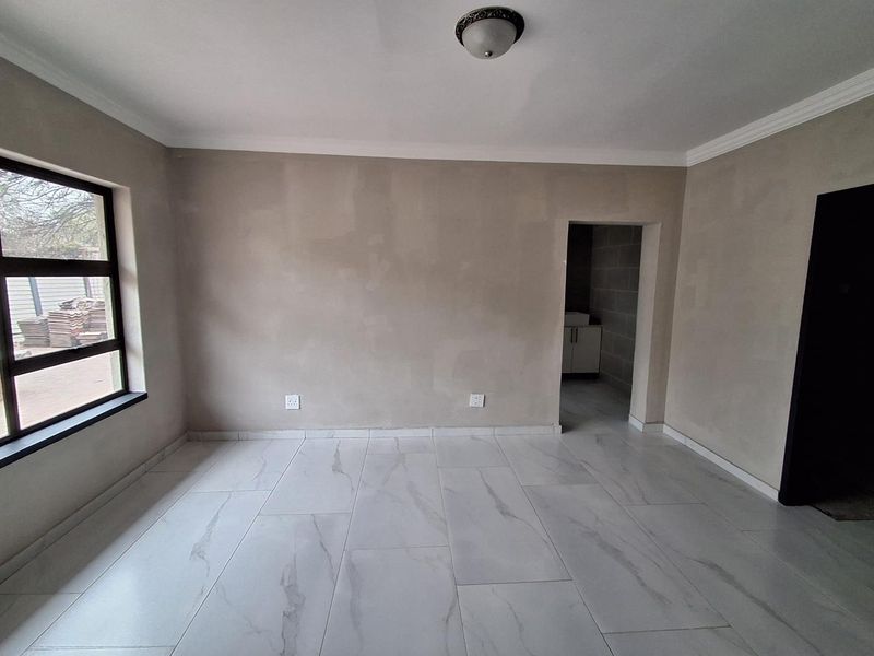 Bargain Alert! Brand-New Renovated Family Home at an Unbeatable Price in Risiville - Photo 8