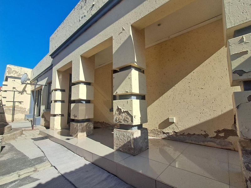 Complete This 2-Bed Home & Profit from 6-Room Rentals Now! - Photo 10
