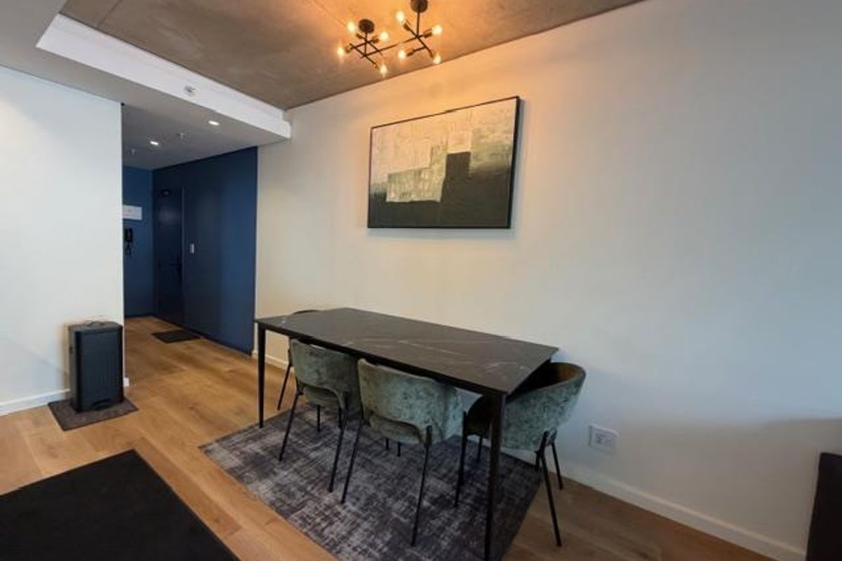 **Experience Modern Luxury Living at Station House** - Photo 4