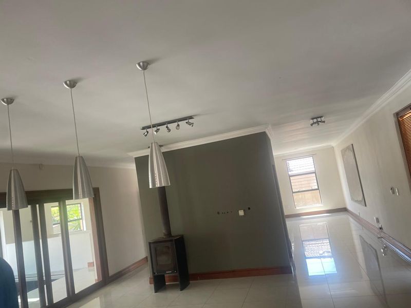 Modern double-storey home in Randpark Ridge featuring an indoor pool, 3 en-suites, wine cellar, double garage, plus a separate 2-bed cottage with its own garage - Photo 7