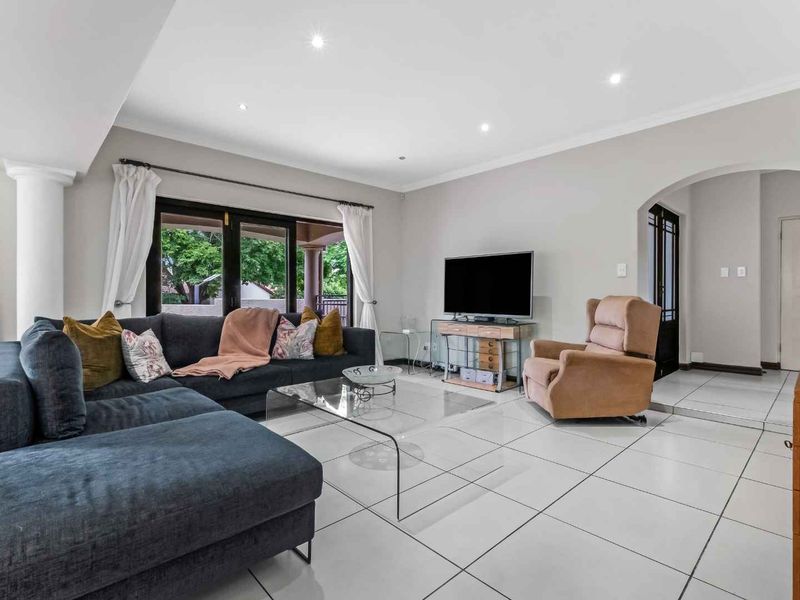 STRIKING DUPLEX HOME IN A QUIET SECURE ESTATE - Photo 2