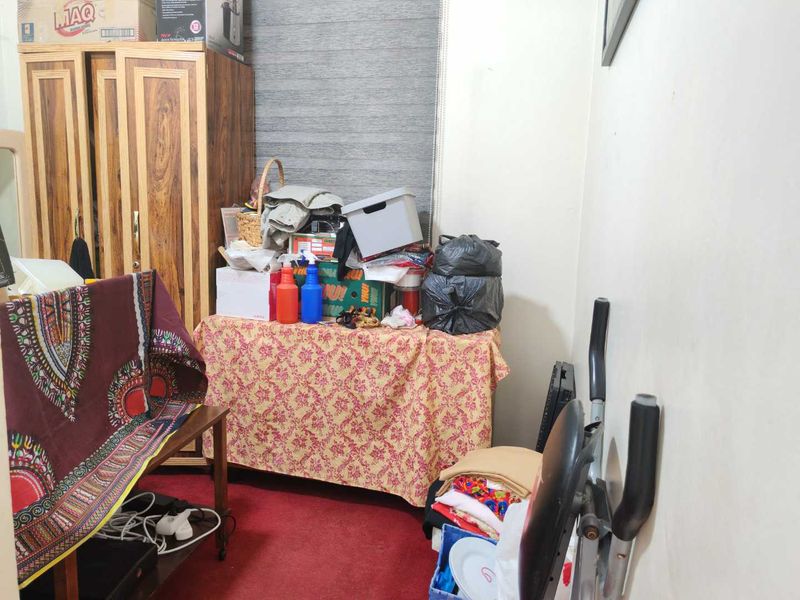 Spacious 4-Bedroom Home with Income-Generating Potential - Photo 10