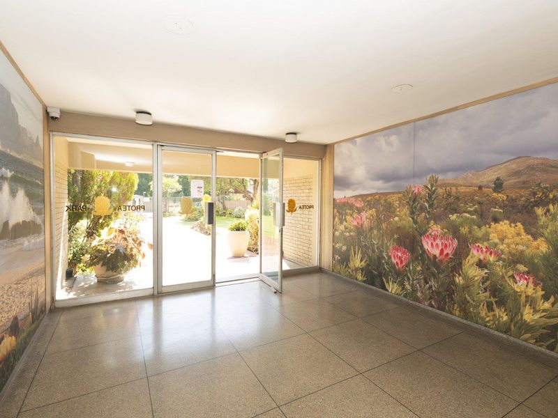 Spacious living with scenic views in a secure setting. - Photo 5