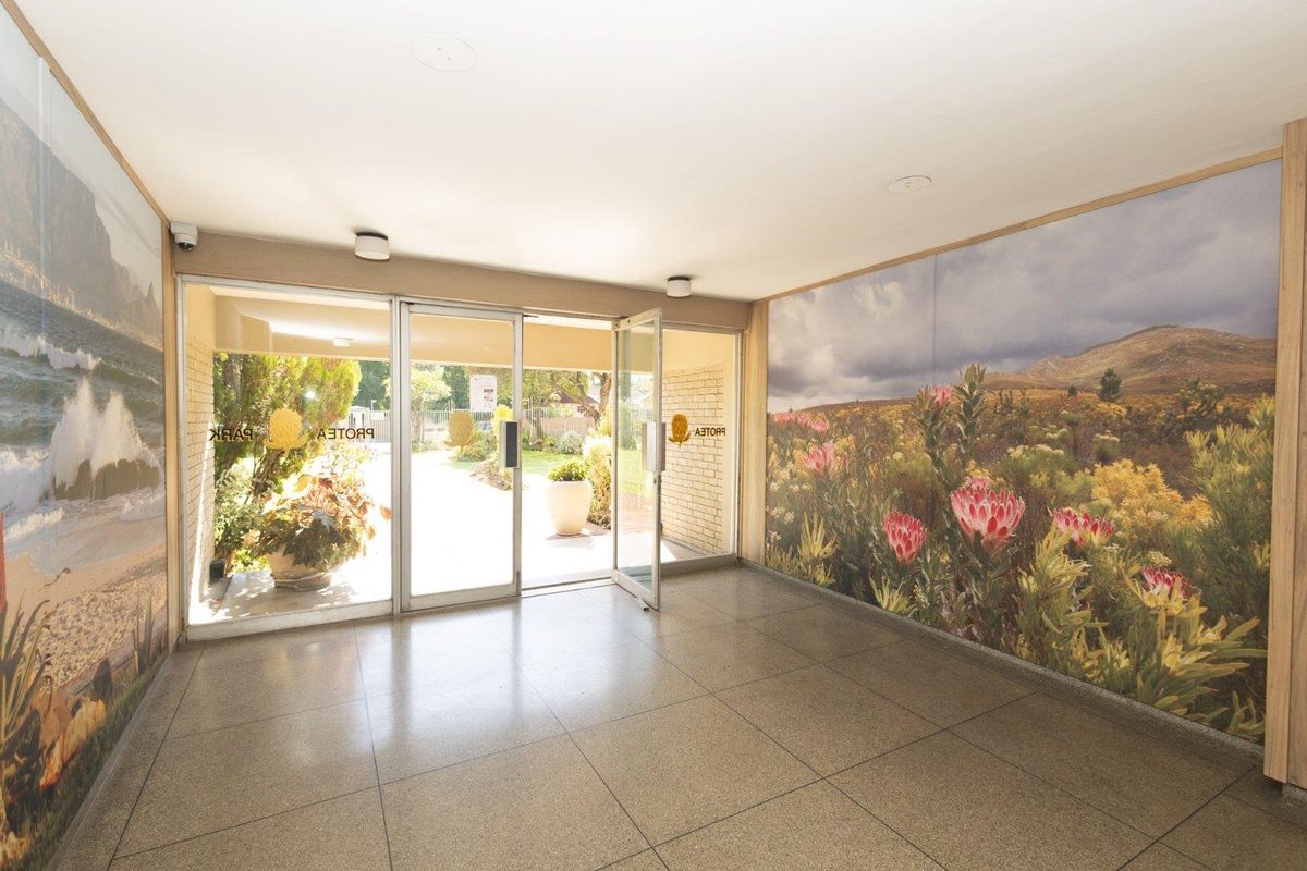 Spacious living with scenic views in a secure setting. - Photo 5