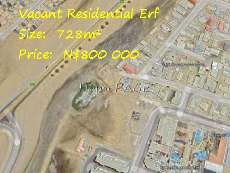 An aerial view of a vacant residential erf measuring 728 square meters, situated within a developed residential area.