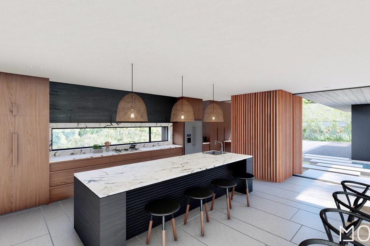 Modern open-plan kitchen featuring a marble island, sleek timber cabinetry, integrated appliances, and a striking slatted wood feature wall.