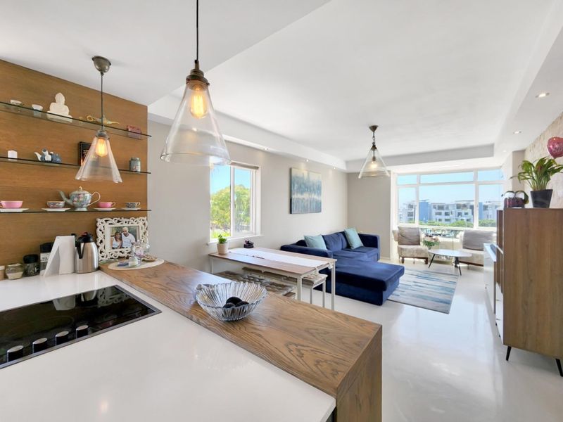 Sun Kissed Two Bedroom Apartment with Balcony and Garage - Photo 3