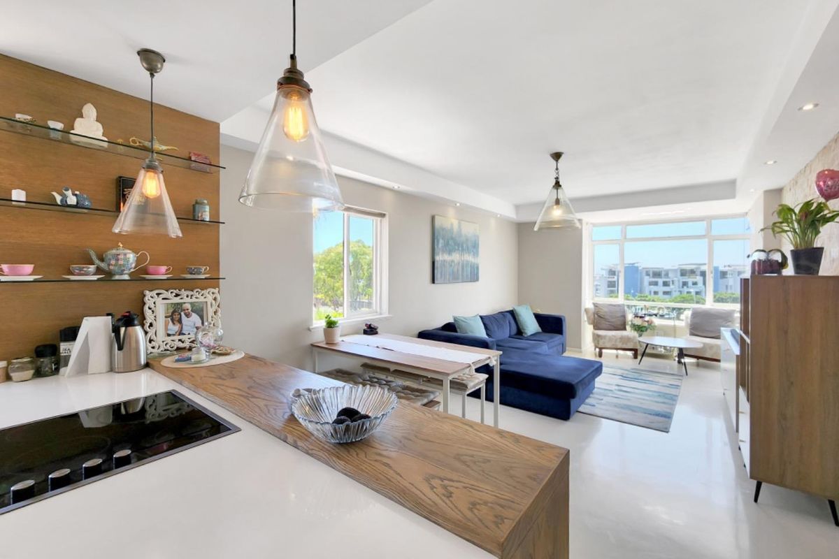 Sun Kissed Two Bedroom Apartment with Balcony and Garage - Photo 3