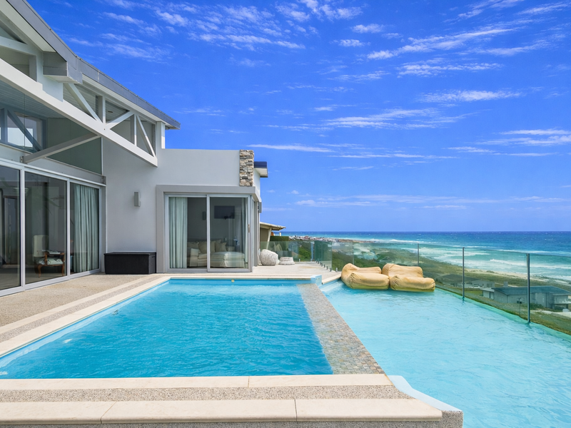Beachfront Home on sandy shores - A Coastal Gem - Photo 1
