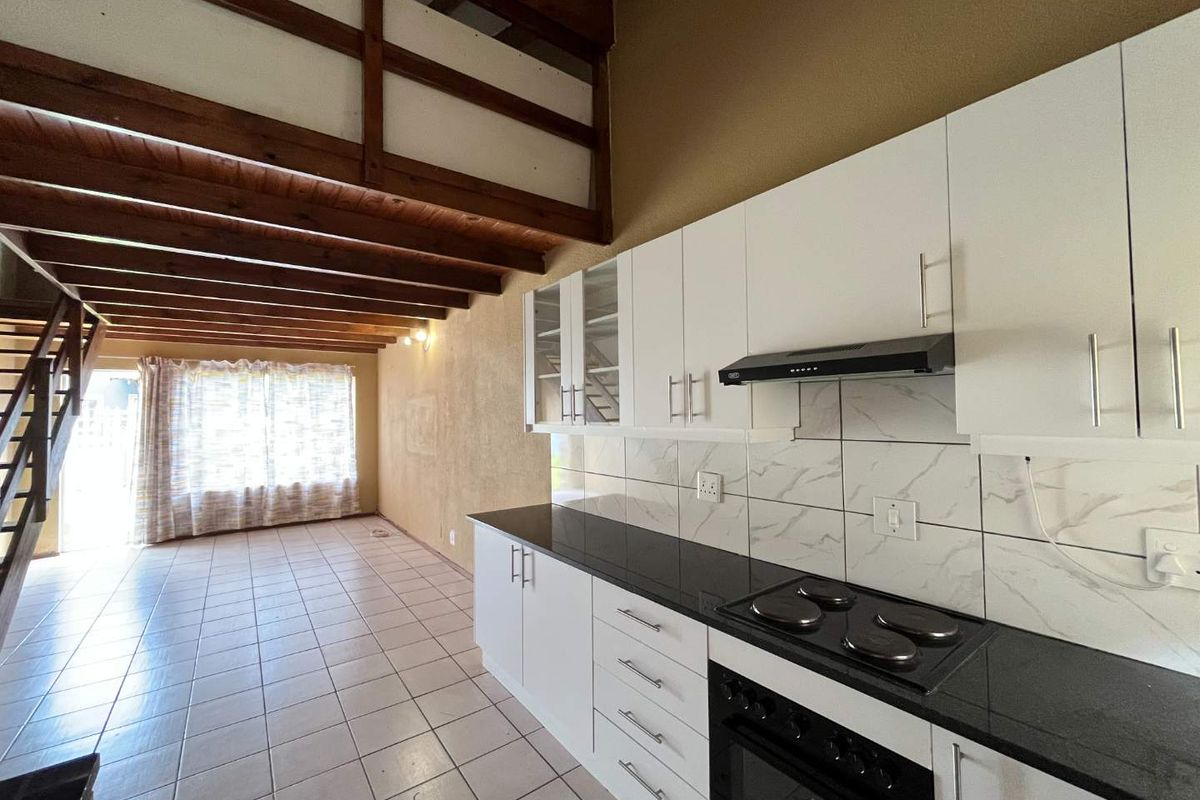 Newly Renovated 2 Bedroom Sectional Title Unit with Mezzanine - Photo 5