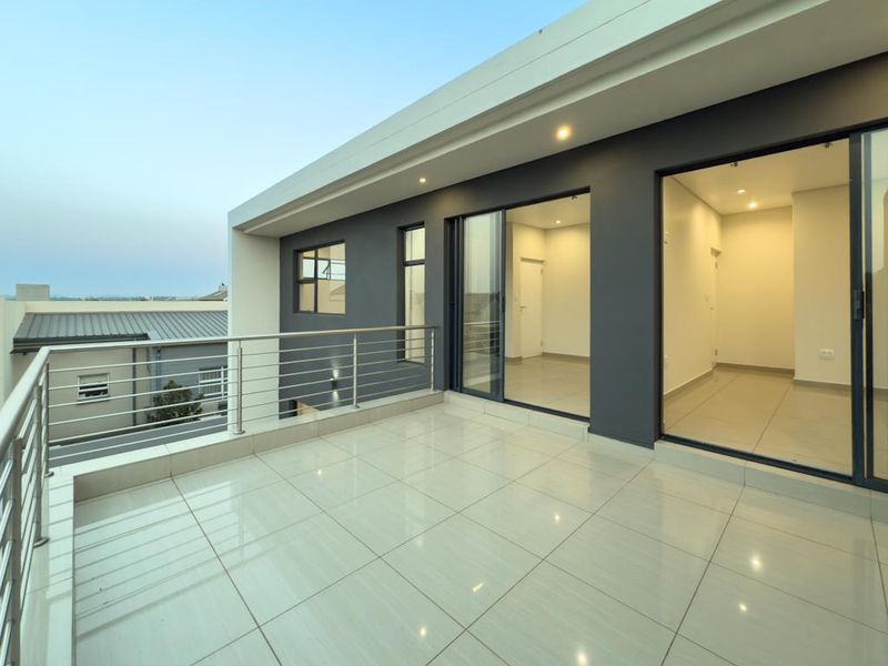 Modern Architectural Gem with Versatile Living & Expansive Balcony in Midstream Meadows - Photo 6