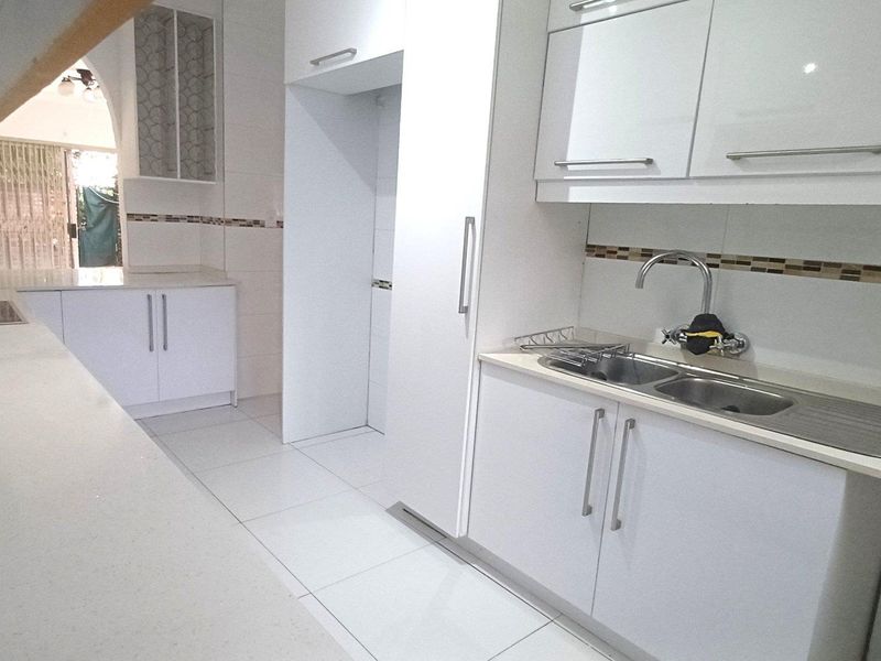 Spacious, Affordable Double-Storey Living with Patio & Pool - Photo 5