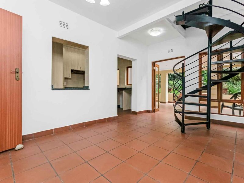 WELL-KEPT DUPLEX IN SOUGHT AFTER BOOMED ENCLOSURE - Photo 2