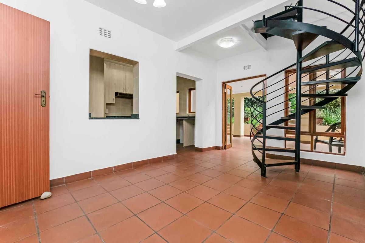 WELL-KEPT DUPLEX IN SOUGHT AFTER BOOMED ENCLOSURE - Photo 2