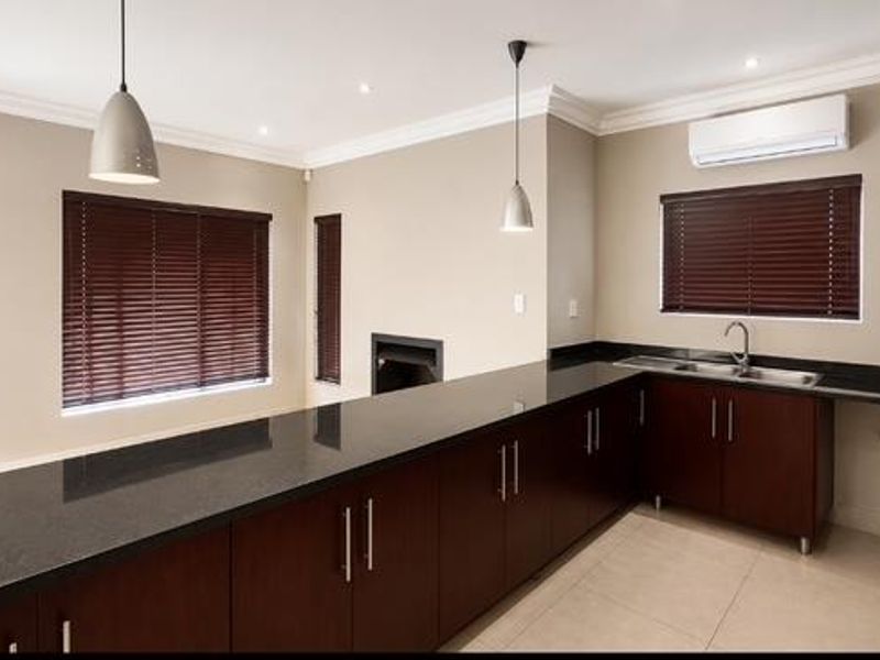 Where Modern Comfort Meets Peaceful Greenbelt Living - Photo 4
