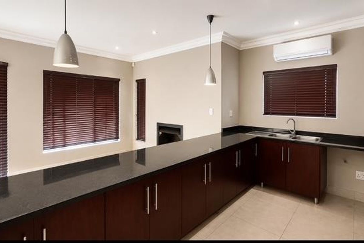 Where Modern Comfort Meets Peaceful Greenbelt Living - Photo 4