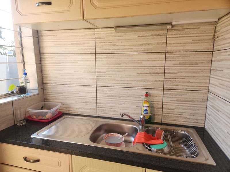 Exceptional Family Home in Enclosed Area with a two Bedroom Flat - Photo 5