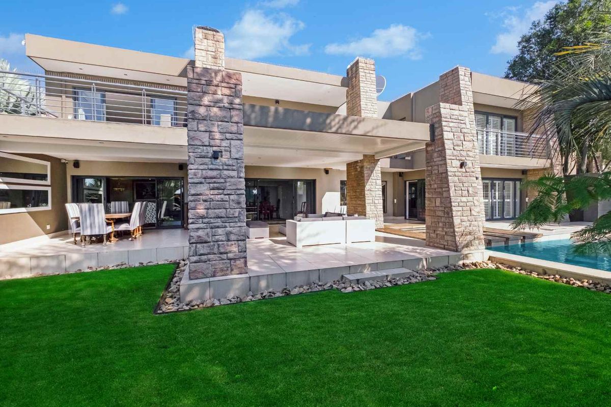 A PRIZED PROPERTY READY FOR ITS NEXT OWNERS BOASTS A FLEXIBLE LAYOUT AND IS TASTEFULLY DESIGNED WITH CAPTIVATING DETAIL - Photo 2