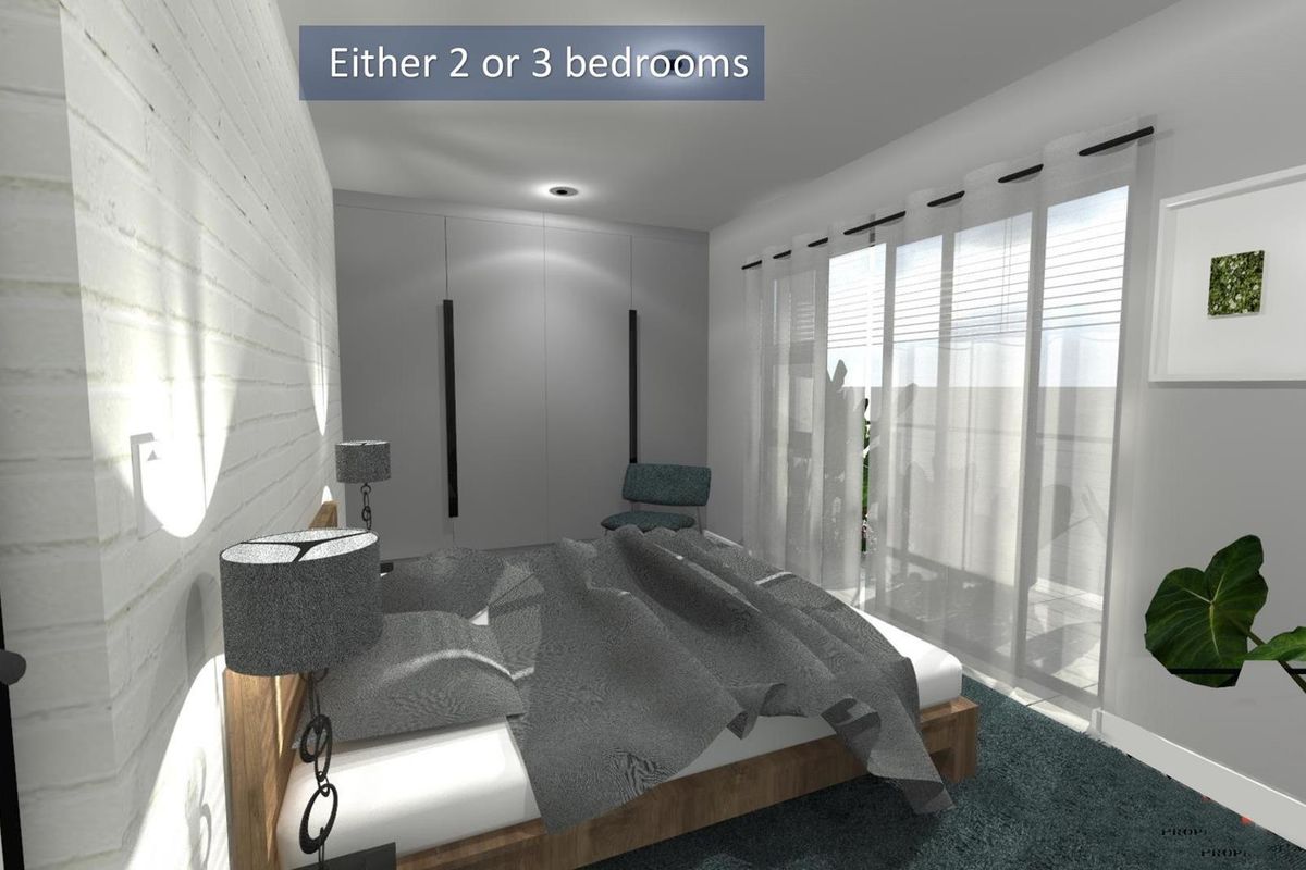 A modern bedroom featuring built-in wardrobes, recessed ceiling lighting, and large glass sliding doors leading to an outdoor area.