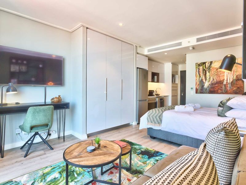 Elevated City Living | 16 On Bree Studio with Balcony | Pool & Views - Photo 5