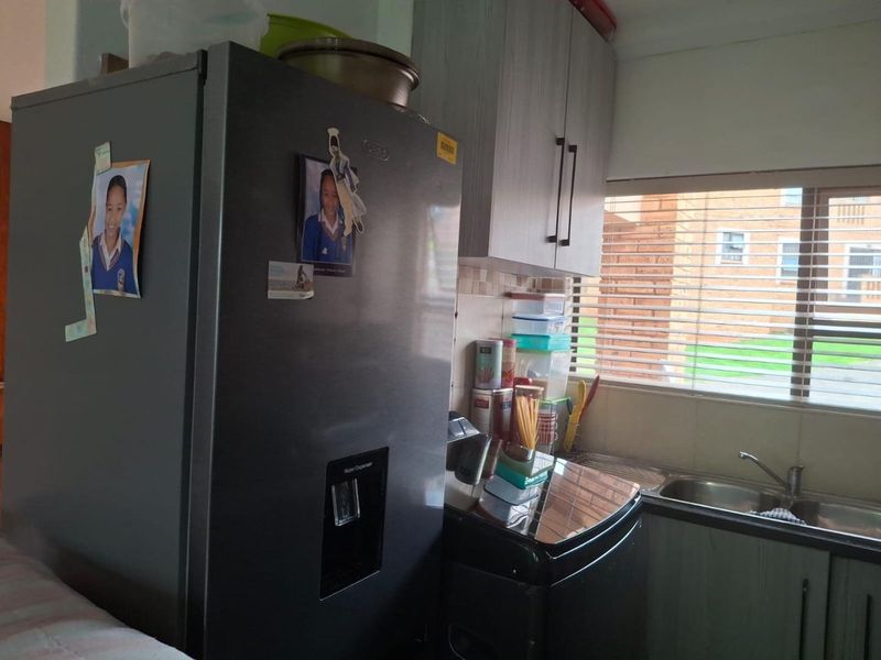 Secure solar powered two bedroom home featuring a built-in braai - Photo 3