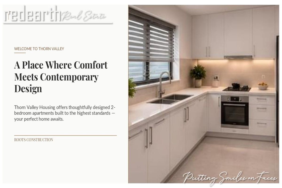 A modern, well-appointed kitchen featuring white cabinetry, stone countertops, integrated appliances, and sleek finishes in a contemporary apartment setting.
