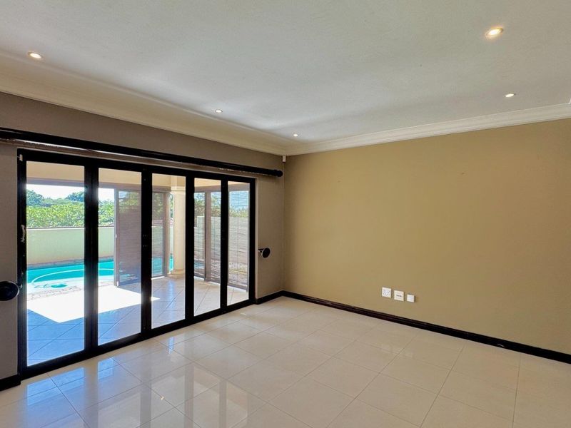 This spacious freestanding townhouse offers comfortable family living with excellent security and stylish finishes throughout. - Photo 8