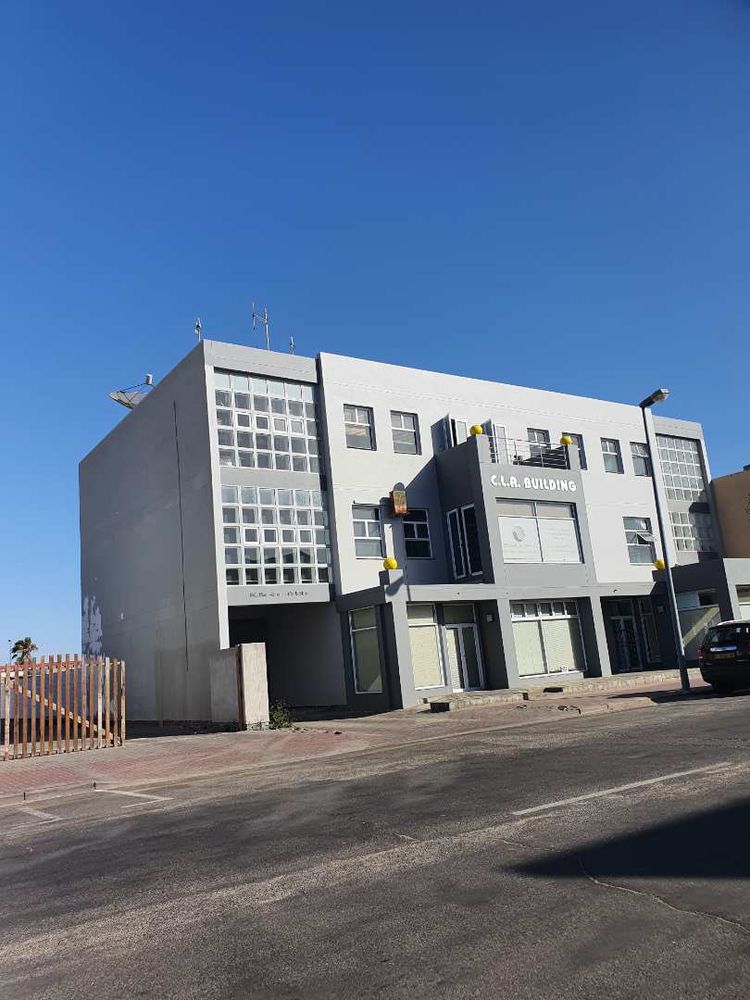 3 downstairs offices or shops plus 1 large back office studio small offices and parking. Top floors divisions can be removed into large open spaces. 