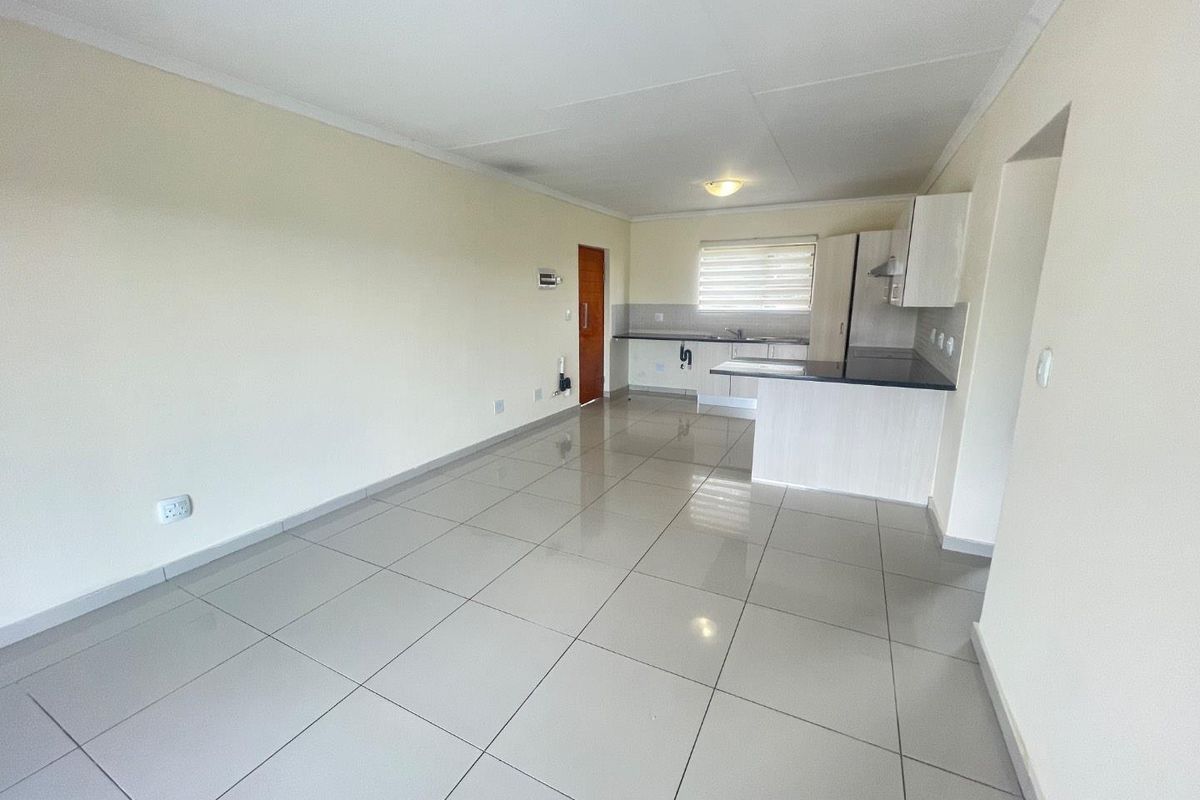 First-Floor Gem: 3-Bedroom Unit in Prime Pomona Location! - Photo 2