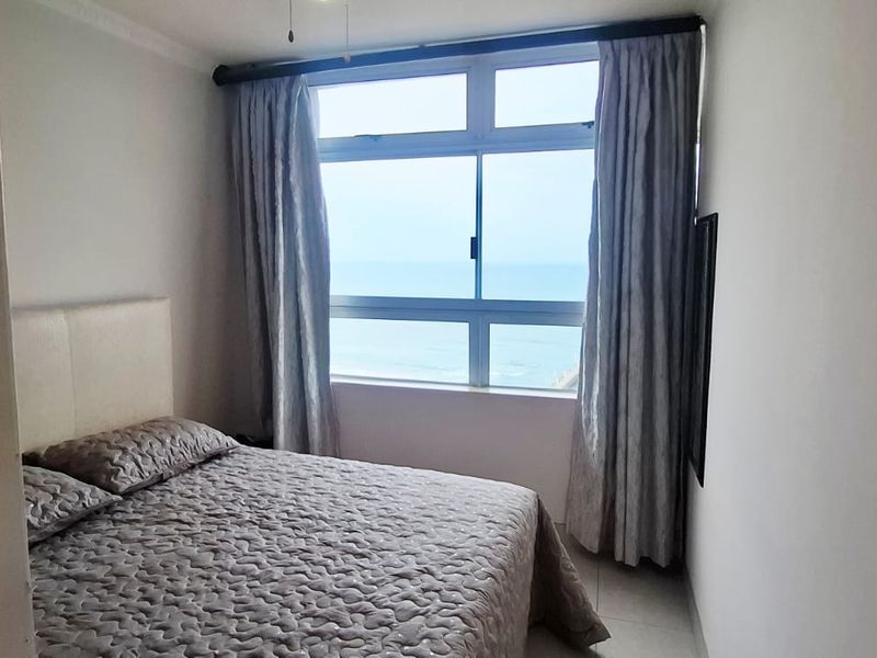 Beachfront Bliss: Modern Apartment with Uninterrupted Ocean Views - Photo 3