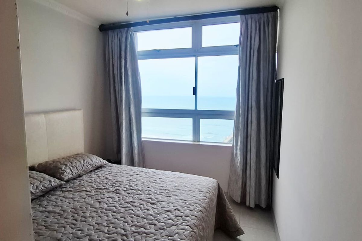 Beachfront Bliss: Modern Apartment with Uninterrupted Ocean Views - Photo 3