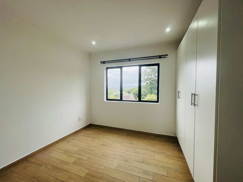 Hendra - Sleek Loft-Style Apartment with Solar Savings and Prime Location! - Photo 6