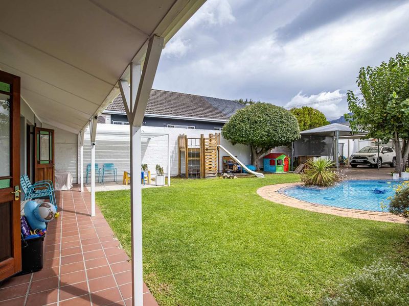 Charming North-Facing Double-Storey Home with Sunny Garden & Pool - Photo 5