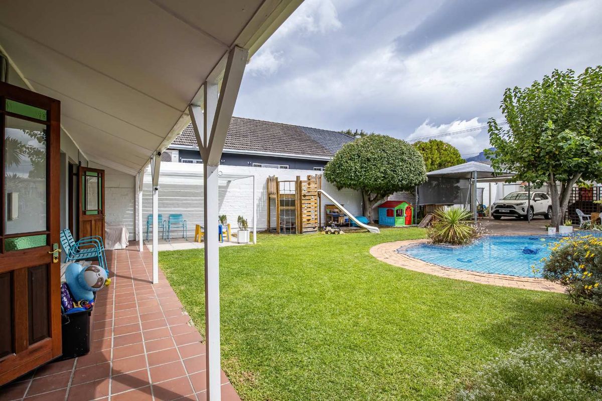 Charming North-Facing Double-Storey Home with Sunny Garden & Pool - Photo 5