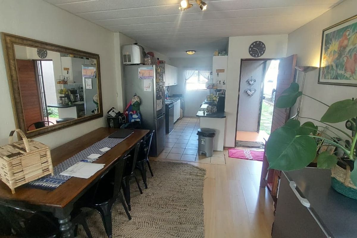 Charming Ground-Floor Gem: Convenience & Style Await! - Photo 2