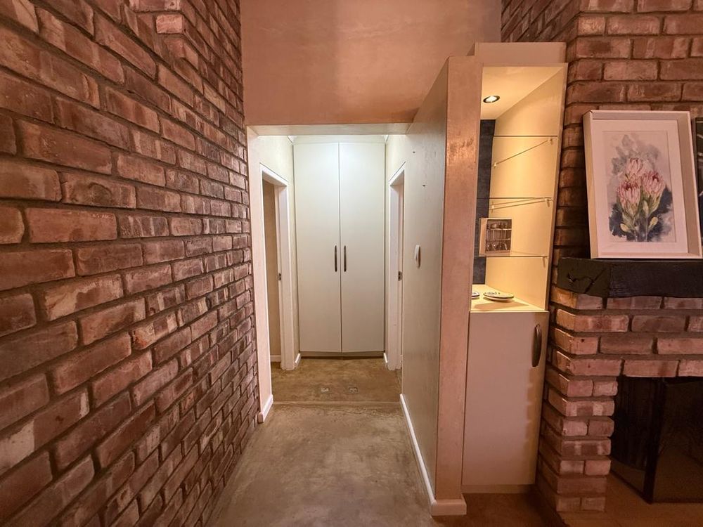 Hallway to the downstairs bedrooms