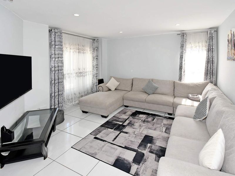 Light-Filled Living with Peaceful Green Views in a Secure Estate - Photo 6