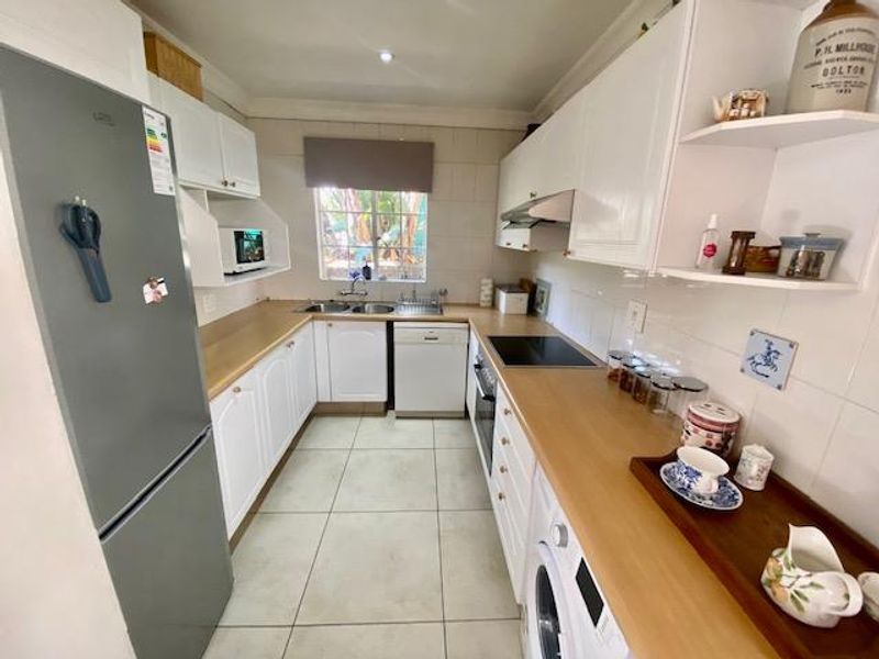 1 BED 1 BATH FULLY FURNISHED GARDEN COTTAGE RIVER CLUB - Photo 5