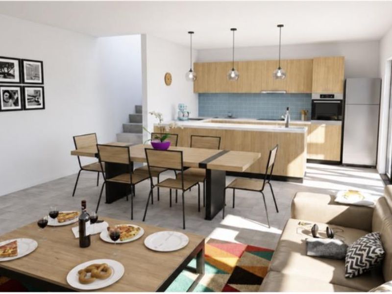 Modern open-plan living and dining area featuring a contemporary kitchen with light wood cabinetry, tiled backsplash, and direct access to outdoor space.