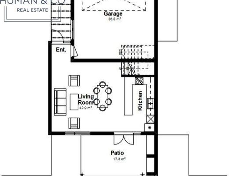 A clear ground floor architectural plan showing the layout of the living room, kitchen, garage, and patio area.