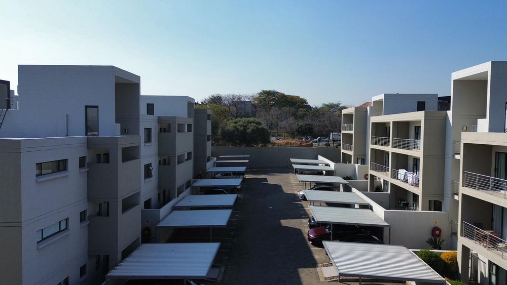 Covered parking bay for each unit