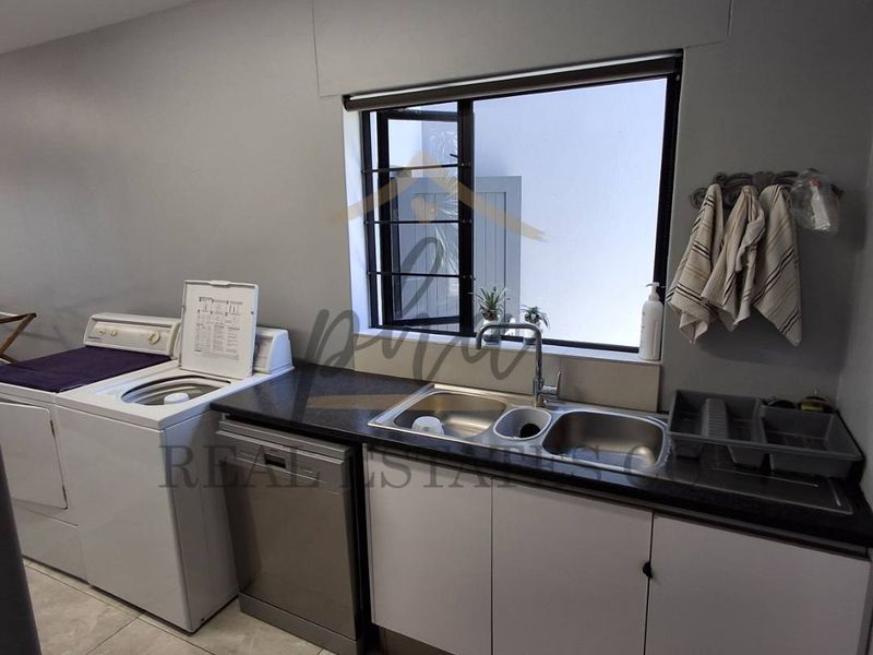 Two Double-Storey Houses with a separate flat on one erf - Registered in a CC - Photo 9