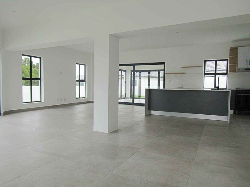 Costal three bedroom home with modern finishes - Photo 3