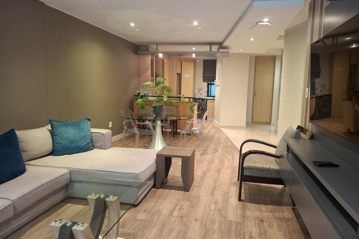 A TASTEFULLY FURNISHED TWO BEDROOM FURNISHED APARTMENT - Photo 3