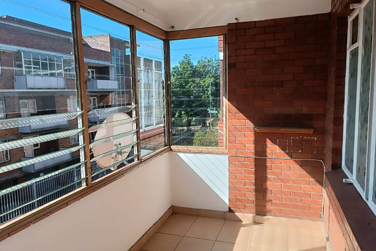 FOR SALE: Neat & Secure 1-Bed Gem – Perfect Starter Home or Investment! - Photo 4